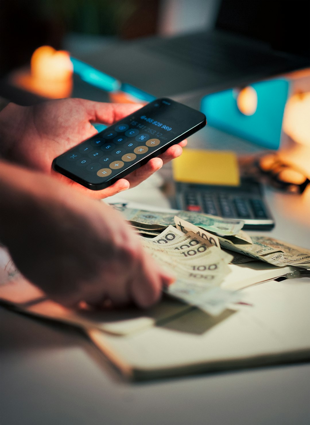 Smartphone calculator Polish currency counting budget finance Person using phone calculator